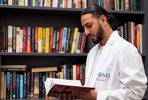 Student in a Medical Library